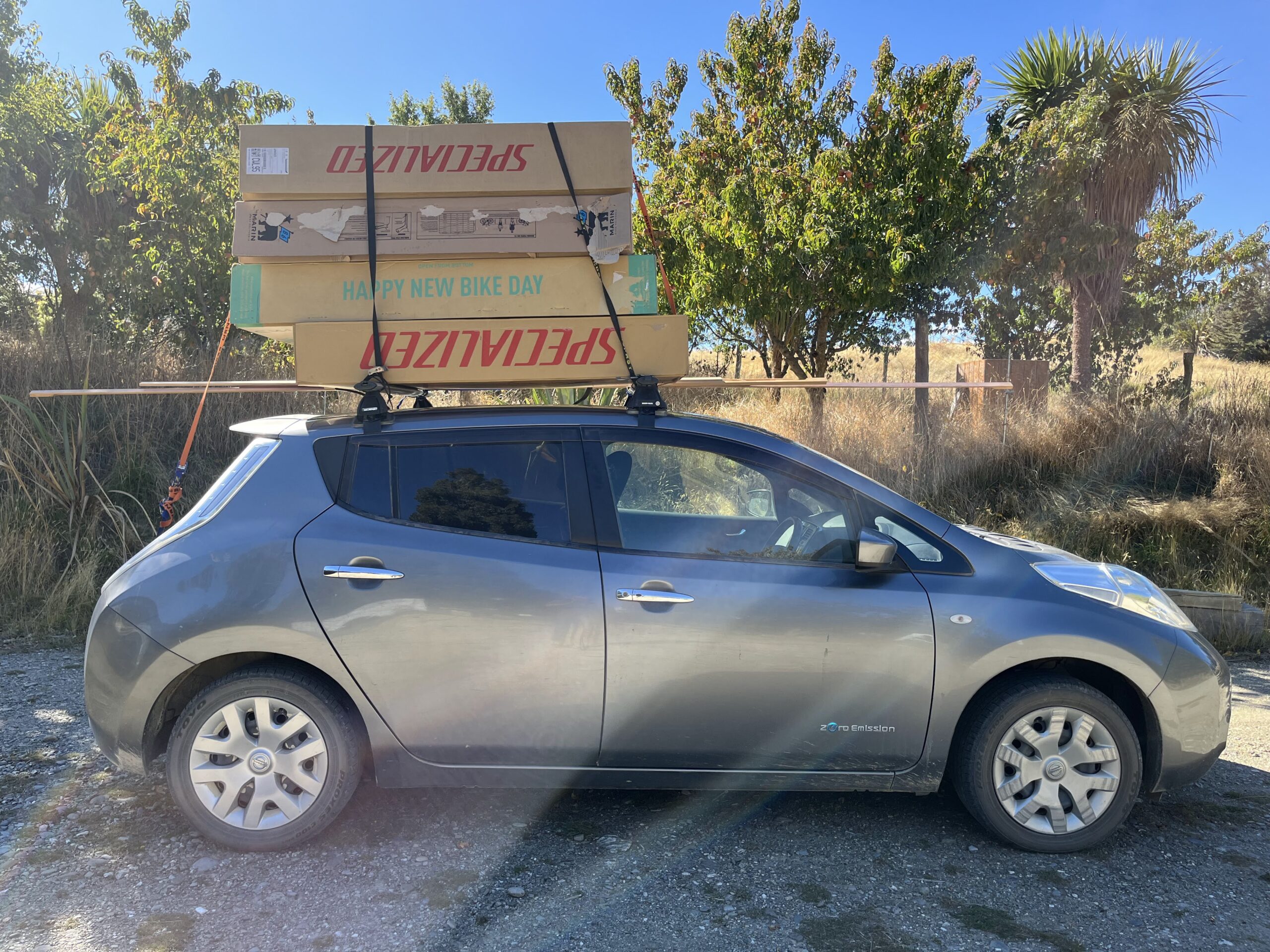 Nissan Leaf with bike boxes before the big trip
